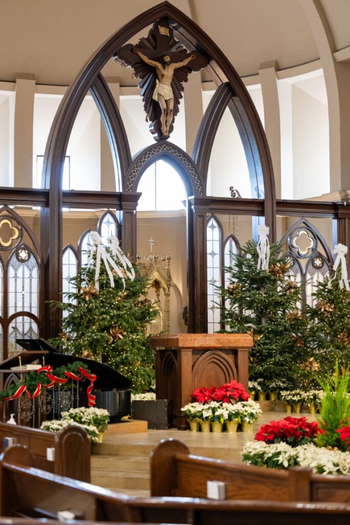 St. Stanislaus Church altar with crucifix and tabernacle in view before the California Catholic Wedding.