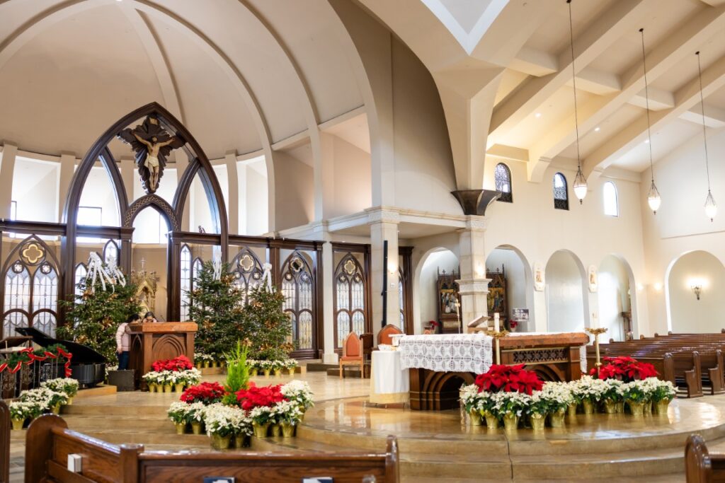 St. Stanislaus Church altar with crucifix and tabernacle in view before the California Catholic Wedding.