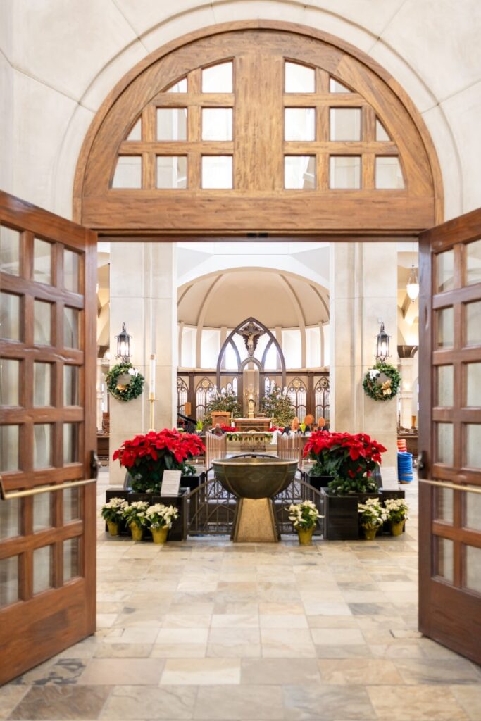 St. Stanislaus Church altar with crucifix and tabernacle in view before the California Catholic Wedding.