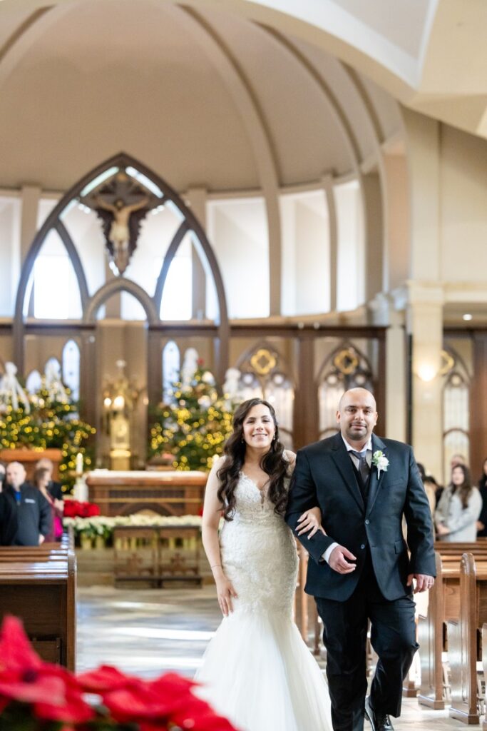 Catholic Bride and Groom processing out of the Church.
